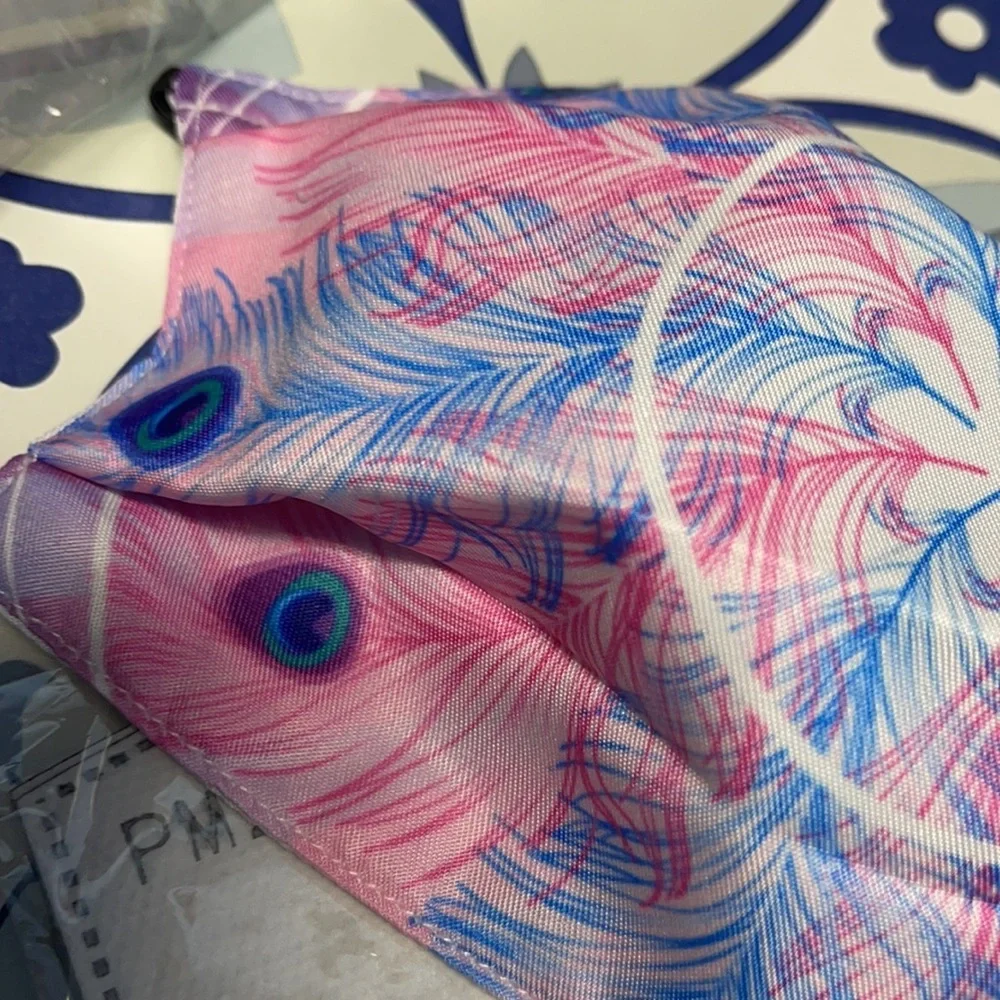 New peacock feather face mask